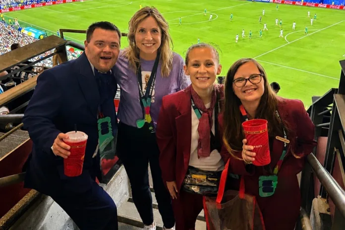 Lola Kernell (right), Myers (second from left) and others at a 2026 World Cup match in Kansas City.