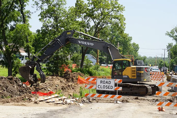 Construction vehicles on Midland Drive