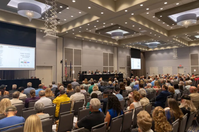 A large crowd gathered for the Johnson County 2027 Budget Hearing and Revenue Neutral Rate Hearing at the Olathe Conference Center on Tuesday night.