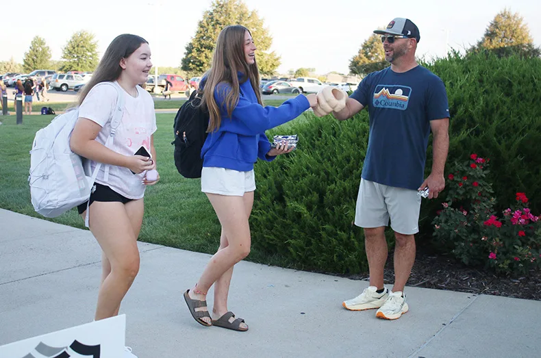 Students arrive at Spring Hill High School for the first day of school.