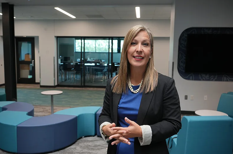 Principal Courtney Domoney talks July 31 about welcoming students and families at the start of the school year.