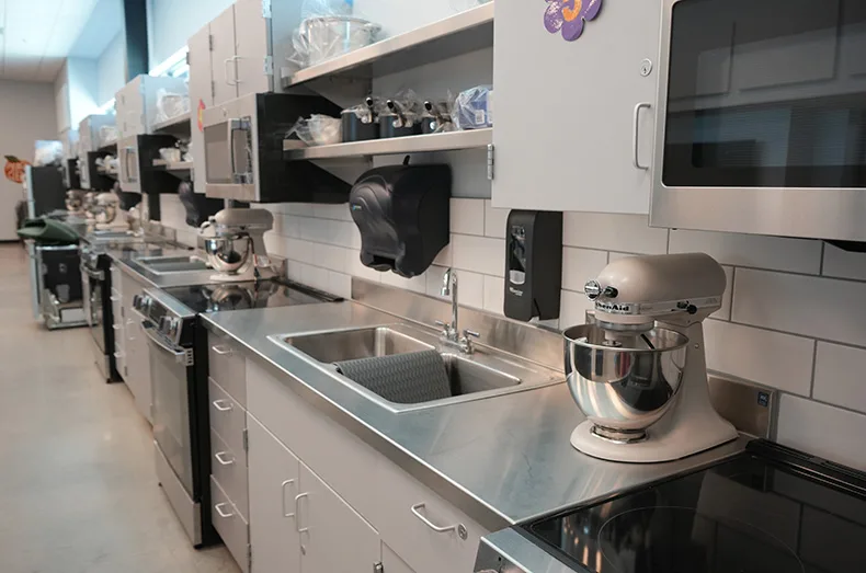 The Family and Consumer Science classroom was designed to feel like a professional kitchen, immersing students in learning.