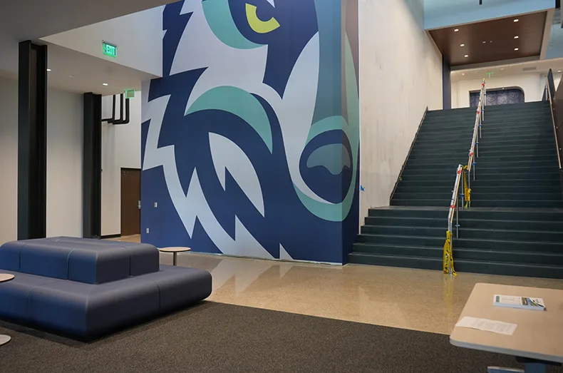 When students walk through the front entrance each day, they’ll be greeted by a mural of the school’s mascot, a coyote.