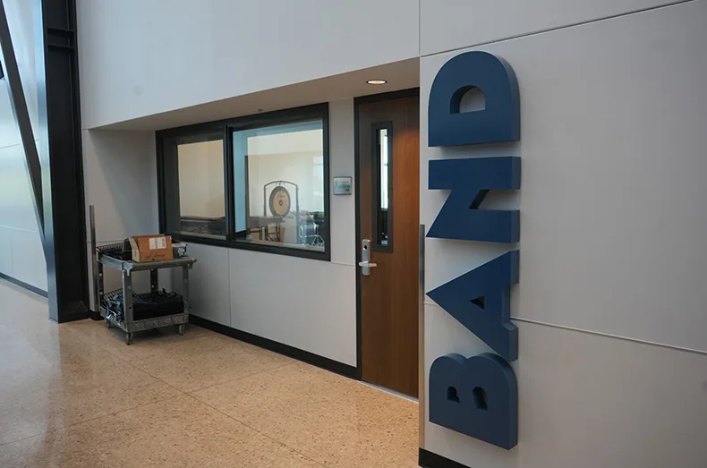 Outside of the elective classrooms, a large sign marks what is taught in the room, making it easier for students to find their classes.