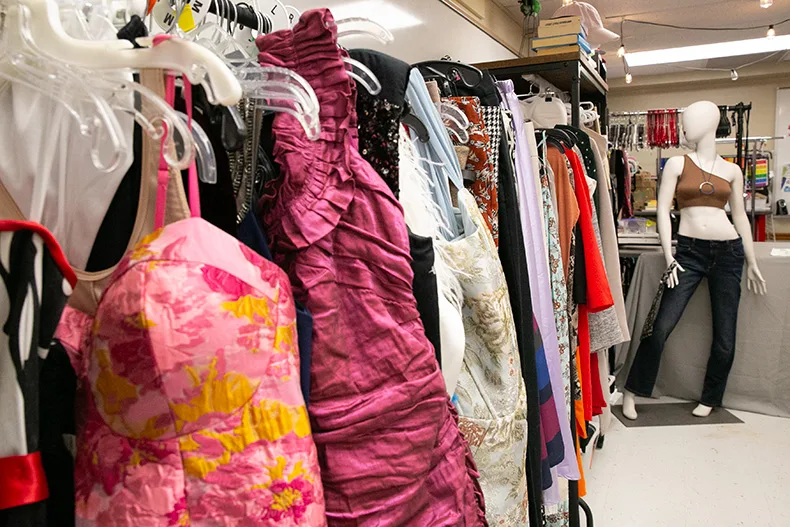A rack of homecoming dresses and long skirts inside Broadmoor Boutique. Photo credit Juliana Garcia. 