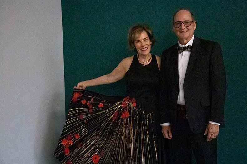 Julie and Hal Hanson wear special formal wear painted by their son Jeff, a painter from Overland Park who was visually impaired.