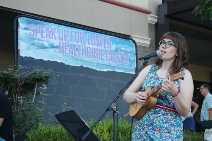 Singer Danielle Ate the Sandwich performs at the Alliance for a Healthy Kansas 