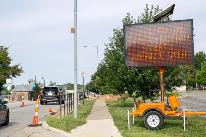 A sign near the CVS in Mission alerts drivers that the Johnson Drive road work begins on Aug. 17. Photo credit Juliana Garcia.