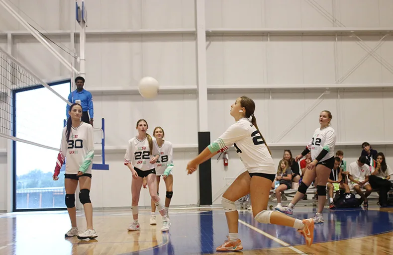 San Diego's Finley Dam (center) runs toward the ball as teammates (from left) Irina Laboshka of Bulgaria, Hazel Copans of San Diego, Daniella Levi of San Diego and Abigail Haar of Kansas City watch. The athletes were competing on a combined team that also included players from Ukraine.