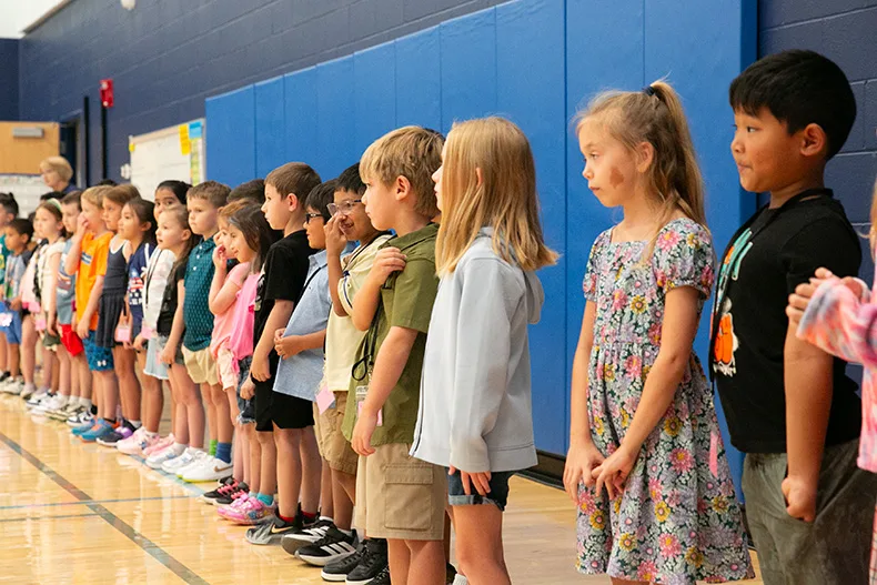 Pawnee Panthers spent their special hours on the first day of school in the gym with all the specials teachers. Above, first grade students line up for Simon Says. Photo credit Juliana Garcia.