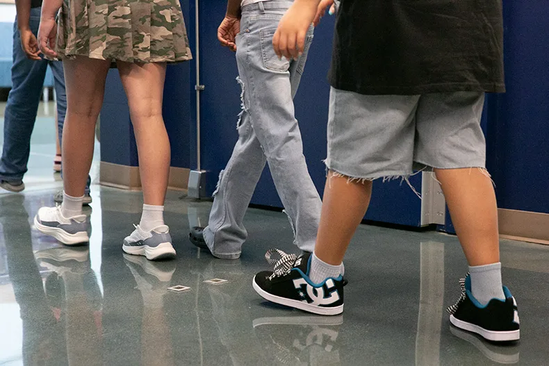 Shawnee Mission elementary students walk through the hallway. Photo credit Juliana Garcia.