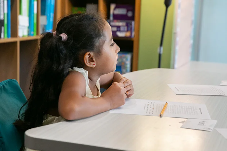 Pawnee Panthers got right back into routines on the first day. Above, a third grade girl listens intently to her teacher's instructions. Photo credit Juliana Garcia.