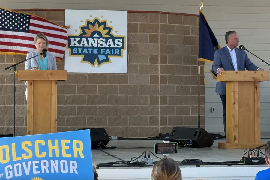 Masterson (right) and Holscher meet at the Kansas State Fair.