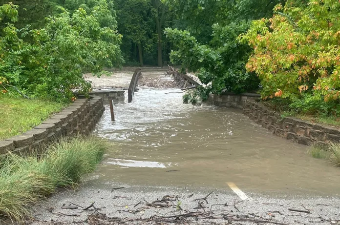Indian and Tomahawk creeks converge in Leawood City Park, making the area just south of I-435 frequently at risk of flooding and park closures. Above, a bridge over Indian Creek closed in July 2025 when the creek flooded.