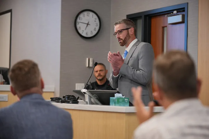 Briarwood Elementary parent Eric Johnson, a member of the 110-person taskforce that discussed whether or not schools, and how many, should be closed, spoke during Thursday night’s Olathe Board of Education meeting.