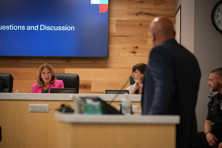Board member Stacey Yurkovich asks Deputy Superintendent of Organizational Operations Jim McMullen a question about transportation variances for students changing schools. If a safety concern arises, like students have to cross a major roadway, the district will work with families to ensure their students can get to school safely.