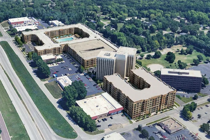 An aerial rendering of the Foxridge Apartments with the office tower and additional seven-story building off of Metcalf Avenue. Image via city documents.