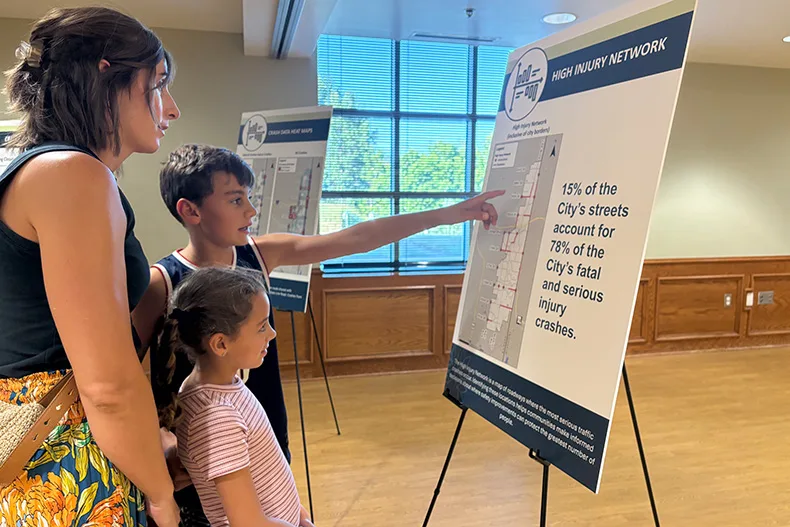 Leah Maugans (left) with her daughter, second-grader Zella, and son, fifth-grader Archie, at the open house.