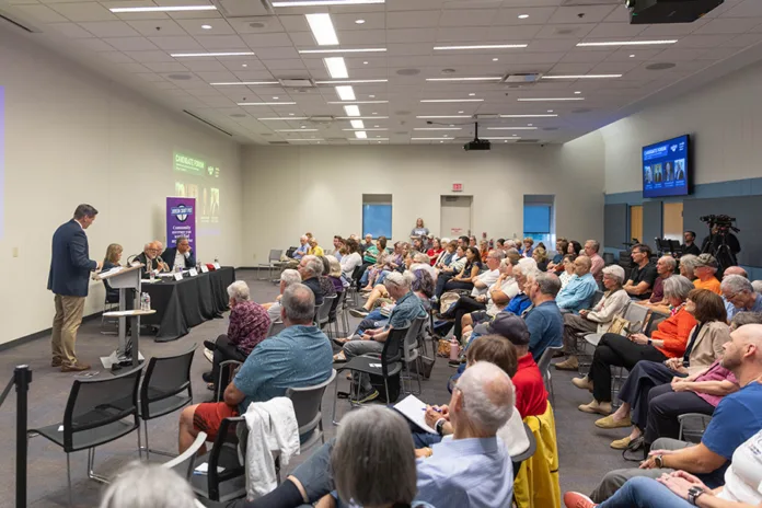 More than 100 people showed up to the Post's forum Tuesday, Oct. 6, to hear from candidates seeking commissioner seats to represent districts 1 and 5 on the Johnson County Board of County Commissioners.
