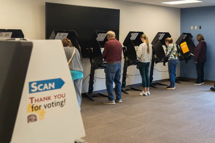 Early voters cast their ballots on Tuesday, Oct. 20, at Hilltop Conference Center Blue Valley in Overland Park.