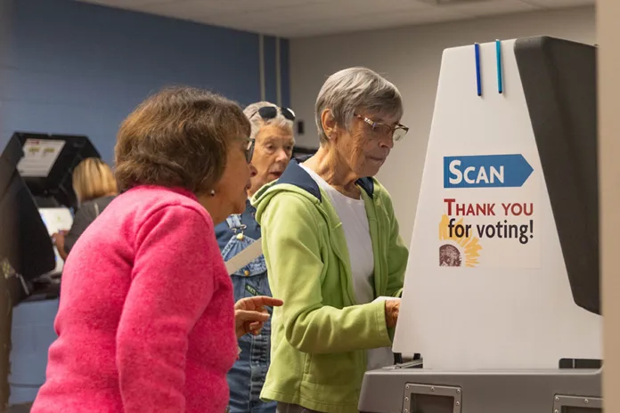 Early voters cast their ballots on Tuesday, Oct. 20, at Hilltop Conference Center Blue Valley in Overland Park.