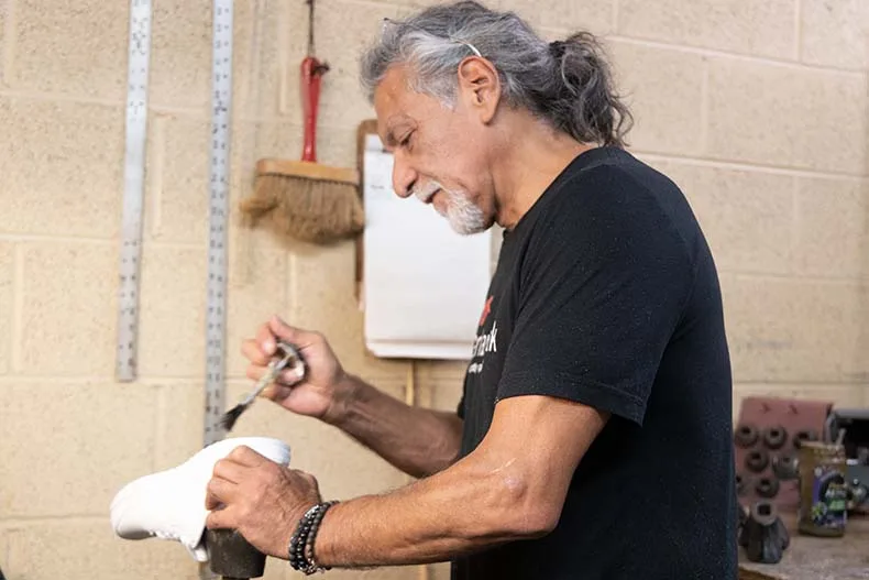 Longtime ‘shoe dude' is closing his Overland Park shoe repair shop