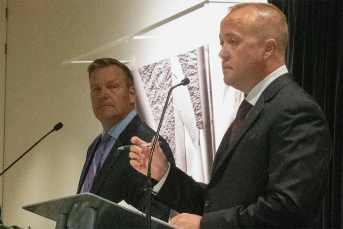 Kris Kobach (left) and Chris Mann during the debate this week in Johnson County.