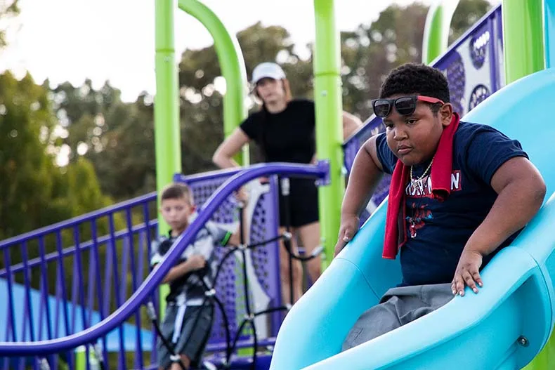Kids of all ages celebrated the opening of Brody's Boundless Playground at the Blue Valley Rec Complex in Overland Park on Tuesday. Named for Brody Rea, a boy who has special needs, the playground is designed to be inclusive for all children.