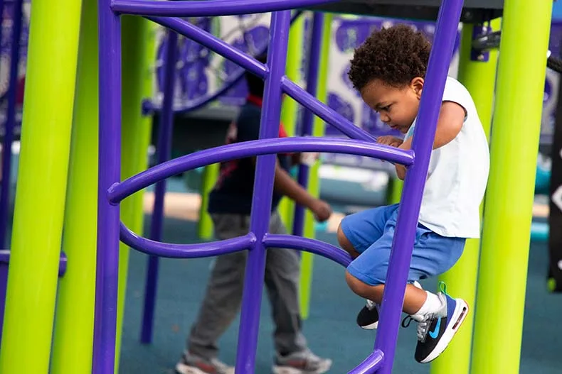 Kids of all ages celebrated the opening of Brody's Boundless Playground at the Blue Valley Rec Complex in Overland Park on Tuesday. Named for Brody Rea, a boy who has special needs, the playground is designed to be inclusive for all children. Photo credit Kaylie McLaughlin.