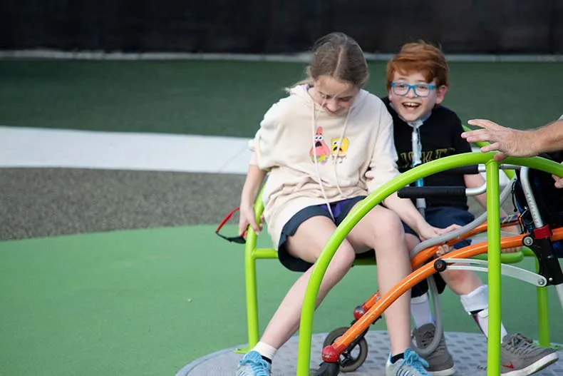 Kids of all ages celebrated the opening of Brody's Boundless Playground at the Blue Valley Rec Complex in Overland Park on Tuesday. Named for Brody Rea, a boy who has special needs, the playground is designed to be inclusive for all children.