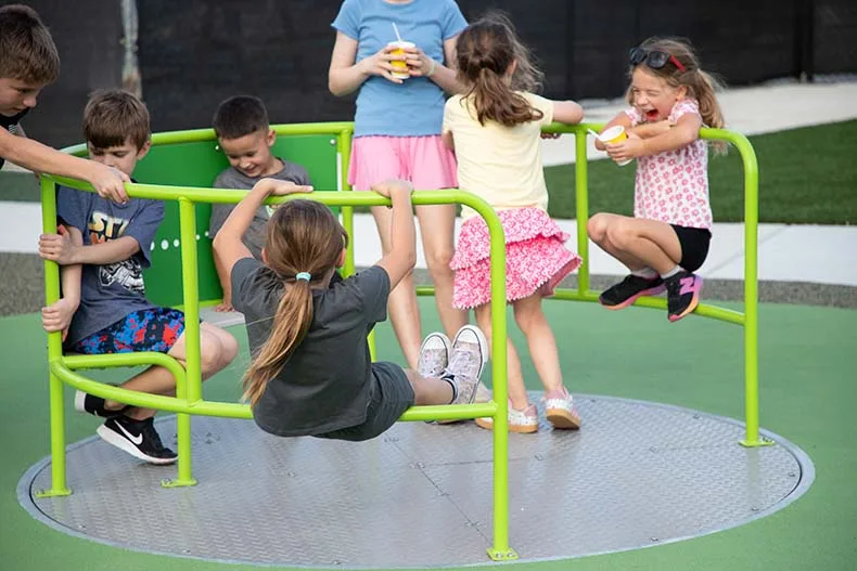 Kids of all ages celebrated the opening of Brody's Boundless Playground at the Blue Valley Rec Complex in Overland Park on Tuesday. Named for Brody Rea, a boy who has special needs, the playground is designed to be inclusive for all children.