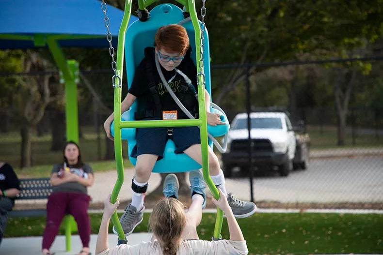 Kids of all ages celebrated the opening of Brody's Boundless Playground at the Blue Valley Rec Complex in Overland Park on Tuesday. Named for Brody Rea, a boy who has special needs, the playground is designed to be inclusive for all children.