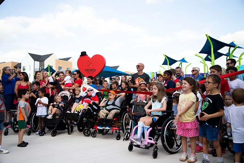Kids of all ages celebrated the opening of Brody's Boundless Playground at the Blue Valley Rec Complex in Overland Park on Tuesday. Named for Brody Rea, a boy who has special needs, the playground is designed to be inclusive for all children.