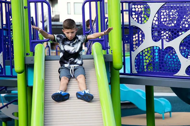 Kids of all ages celebrated the opening of Brody's Boundless Playground at the Blue Valley Rec Complex in Overland Park on Tuesday. Named for Brody Rea, a boy who has special needs, the playground is designed to be inclusive for all children.