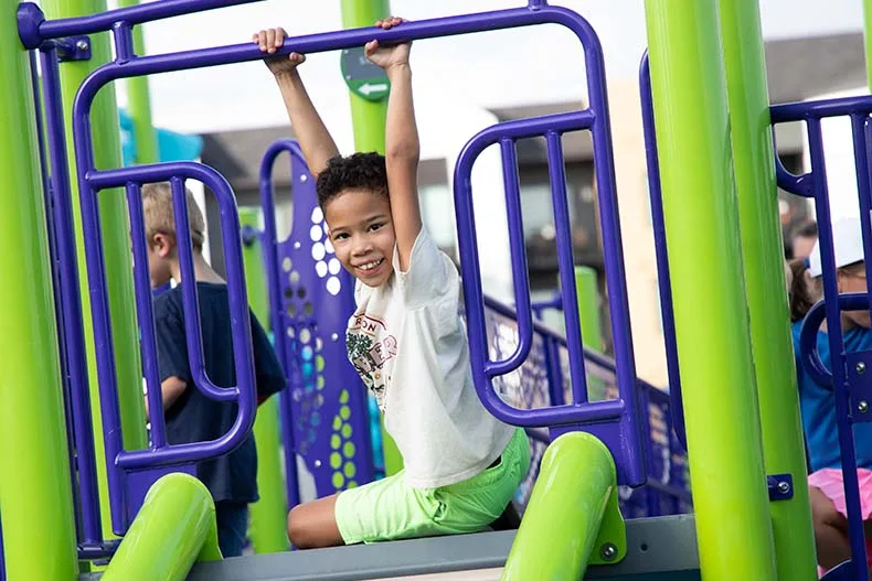 Kids of all ages celebrated the opening of Brody's Boundless Playground at the Blue Valley Rec Complex in Overland Park on Tuesday. Named for Brody Rea, a boy who has special needs, the playground is designed to be inclusive for all children.
