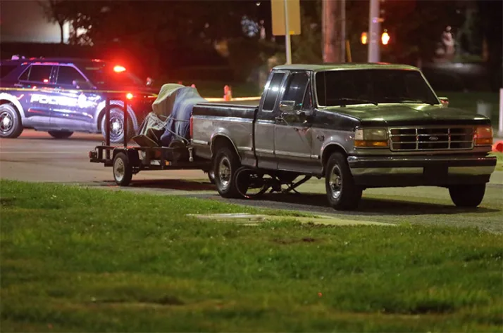 The truck involved in the crash, with the teen's bike visible underneath. Photo credit Mike Frizzell.
